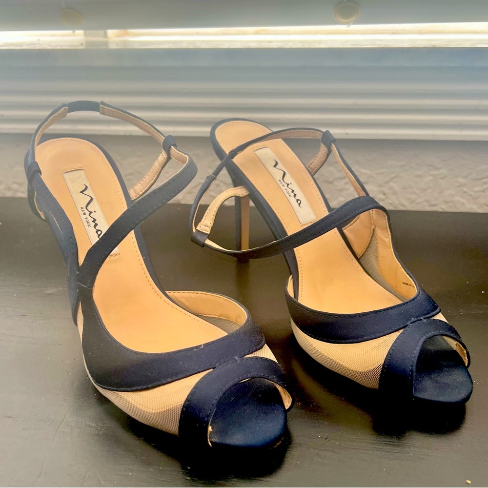 Navy blue heels with sheer cutout